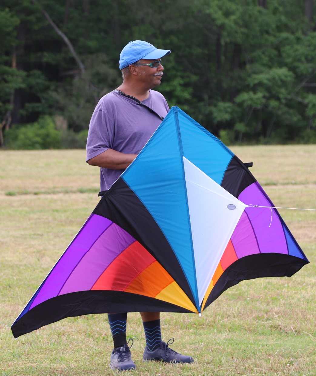 man holding a kite