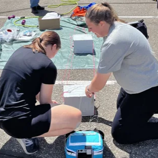 Students preparing a payload